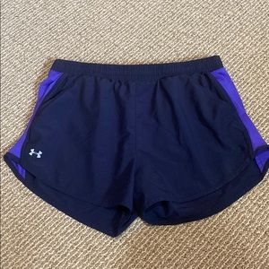 Navy and purple adidas athletic shorts